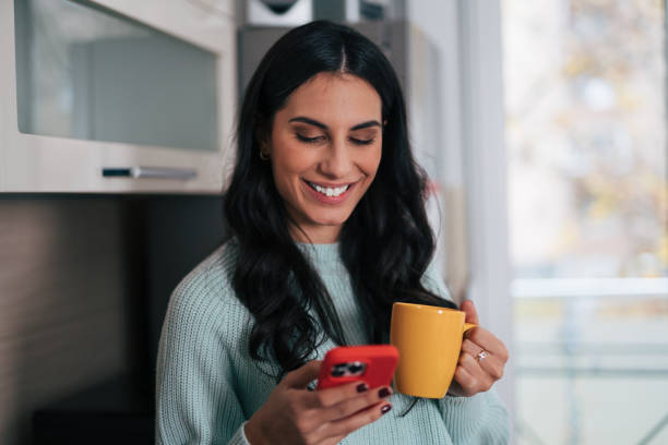 istock Beautiful woman in the kitchen 1839503046