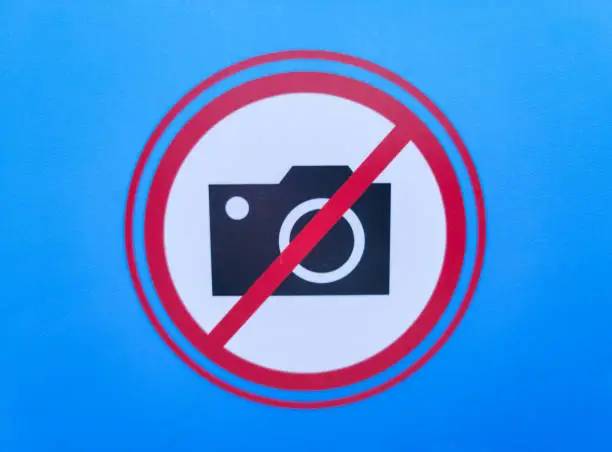 Photo of No cameras allowed sign