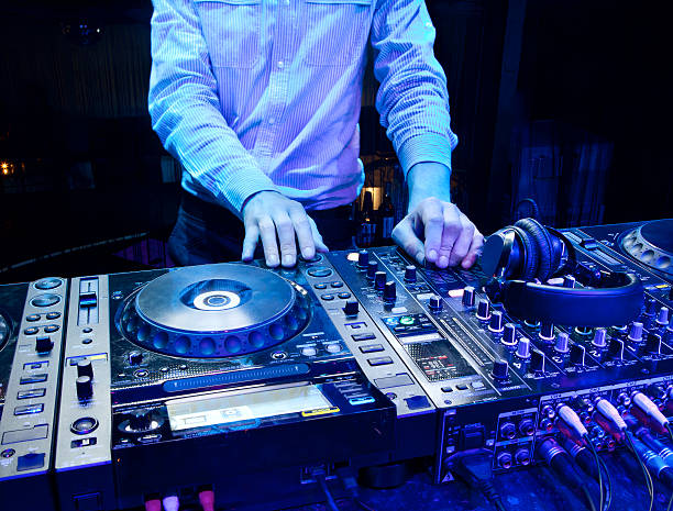 istock Dj mixes the track 183951718