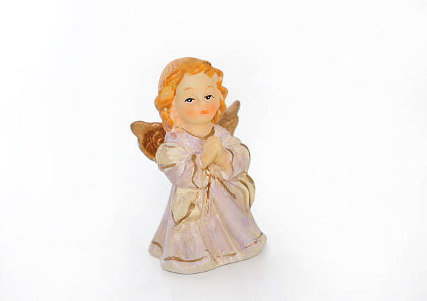 istock Ceramic angel girl on white. 183952022