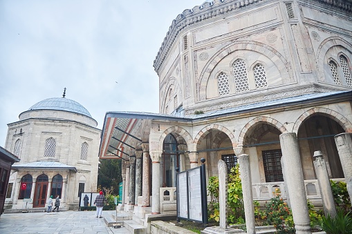 Istanbul, Turkey - November 25, 2021: Cemetery of the Suleymaniye Mosque. Muslim ancient building. Architecture of the 16th century.