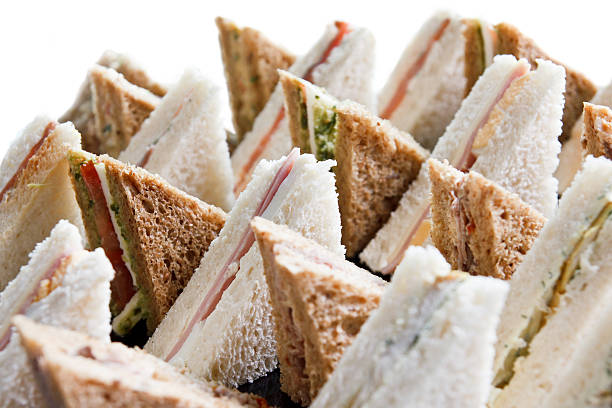 Cut platter of mixed  sandwich triangles
