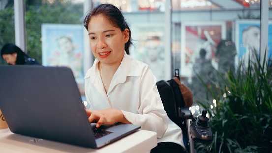 Empowered Connections: Disability Woman Drives Productivity in Hybrid Work with Virtual Meeting