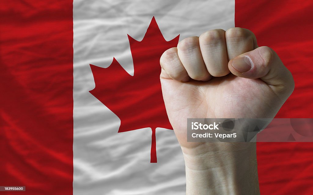 Hard Poing en face de canada Drapeau symbolisant la puissance - Photo de Canada libre de droits