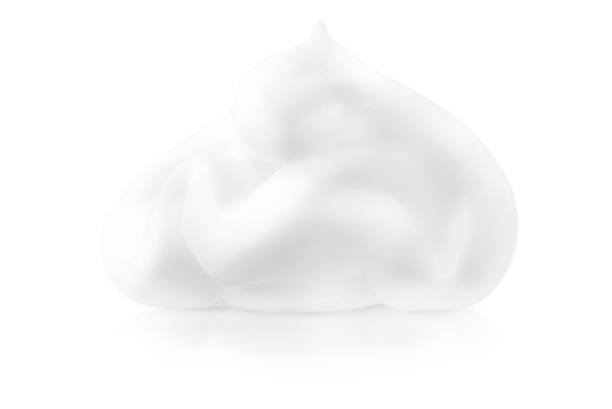 istock A smear of cream isolated on a white background with shadow and reflection. 1839577334