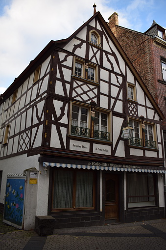 Mayen, Germany - 11/06/2023: old cafe, long closed, half-timbered building