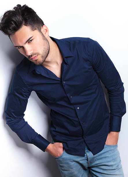 istock young man with his hands in pockets 183961090