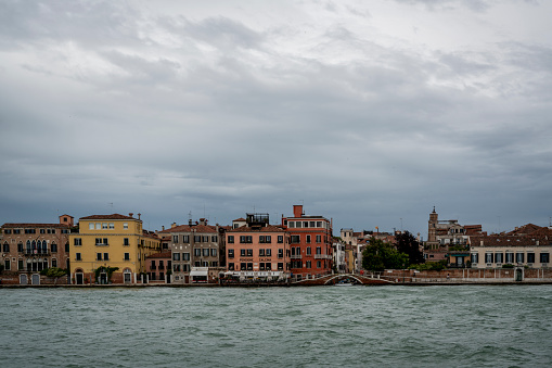 Panorama of Grand canal coast line with a lot of colorful houses, Doge palace and San Marko square in Venice, Italy