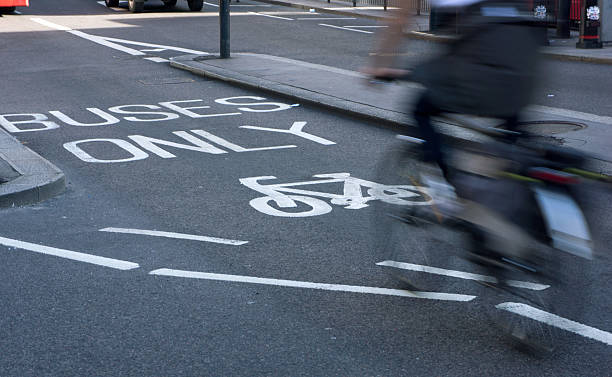 istock Conmuter on bus and cycle lane 183969519