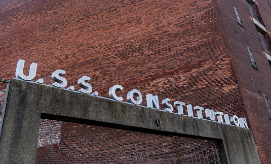 The sign over the dockyards in Boston, home of the USS Constitution. Boston, Massachusetts, USA.