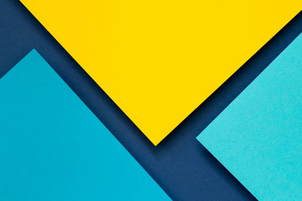 istock Abstract color papers geometry flat lay composition background with blue and yellow tones. Top view 1839740413