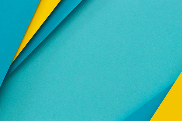 istock Abstract color papers geometry flat lay composition background with light blue and yellow tones. Top view 1839741688