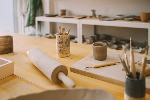 istock Equipment for creating handmade ceramic pottery products at art studio workshop 1839743161