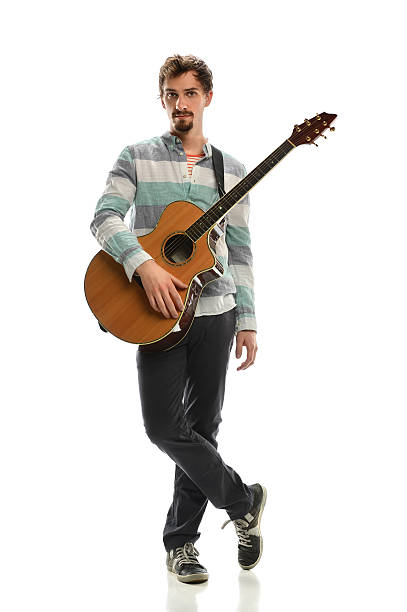 istock Young Man With Acoustic Guitar 183980949