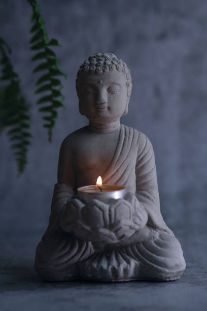 istock a small stone statue of Buddha 1839827622