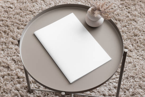 istock Magazine mockup with a pampas on the beige table. 1839849143