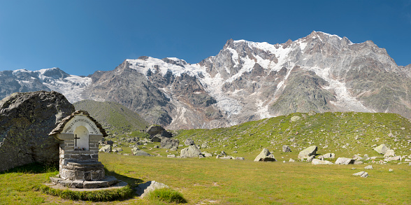 The panorama of Monte Rosa and Punta Gnifetti paks with the little chapell - Valle Anzasca valley.