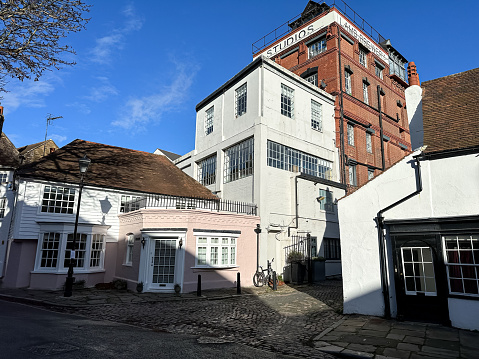 Facades of houses with traditional architecture in the medieval city of York in United Kingdom.