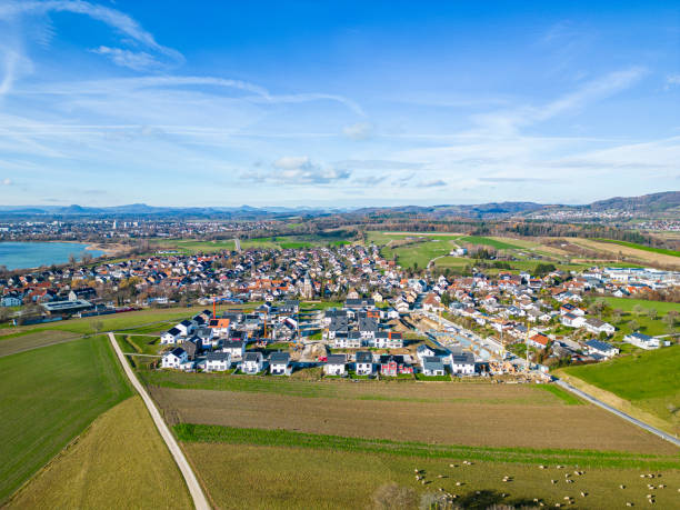 Aerial view from a drone over the city of Markelfingen and Radolfzell and Lake Constance on a sunny day in winter stock photo