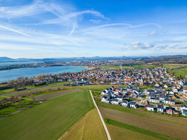 Aerial view from a drone over the city of Markelfingen and Radolfzell and Lake Constance on a sunny day in winter stock photo