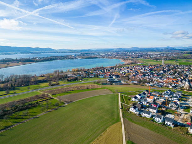 Aerial view from a drone over the city of Markelfingen and Radolfzell and Lake Constance on a sunny day in winter stock photo