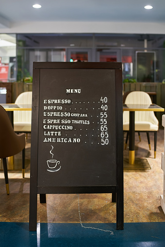Prague, Czech Republic – October 02, 2023: Sign with the drinks on offer and the prices outside a café in Prague