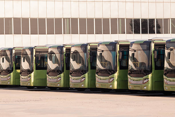 Buses in a row A bus parking, buses in a row,was taken in shenyang,Liaoning province of China.The trademark and copyright text, has been removed from the photo, the rest of the text is the bus warning words.A similar picture:#26181310. shenyang stock pictures, royalty-free photos & images