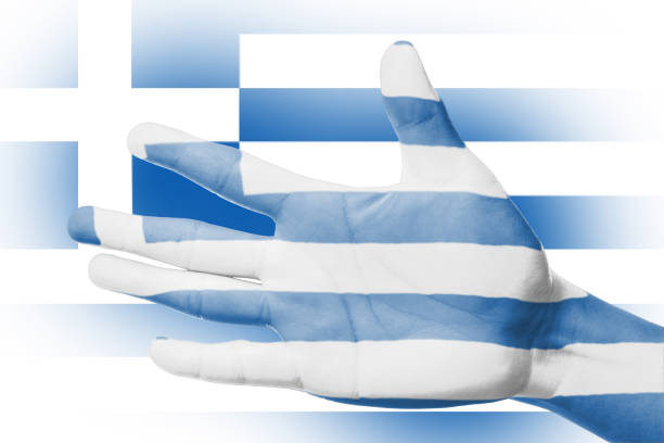 Cheering fan with Painting national Greece flag with your hand with your hand for cheer your national sport