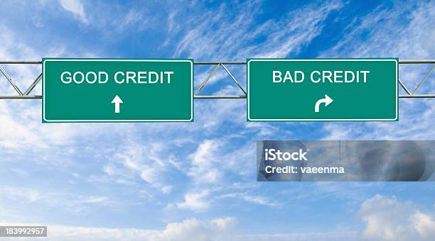 Road Signs To Good And Bad Credit Stock Photo - Download Image Now - Credit Card, Rudeness, Positive Emotion