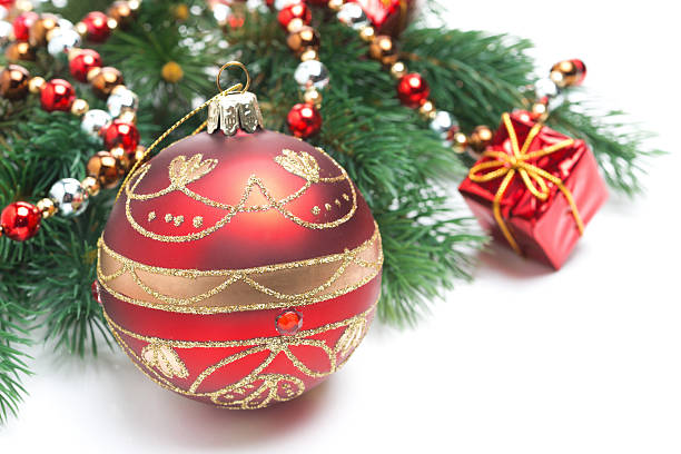 istock red Christmas ball and spruce branches, isolated 183993342