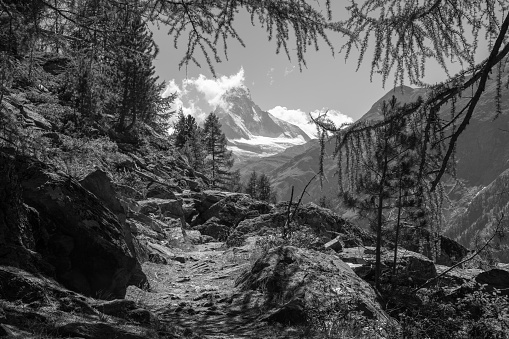 The Matterhorn peak over the Mattertal valley in Walliser alps from Europaweg tour.