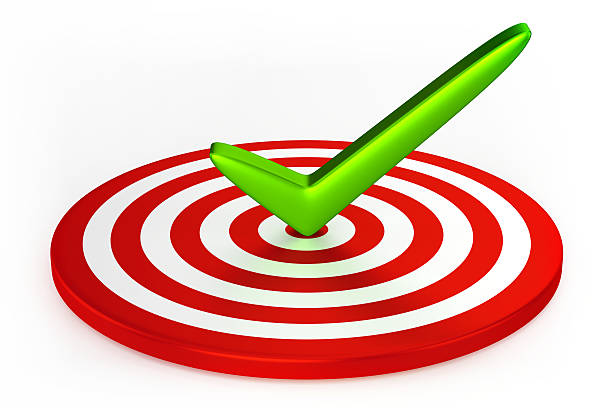 Three-dimensional checkmark in three-dimensional target stock photo