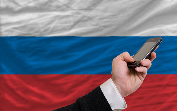 istock cell phone in front  national flag of russia 183996985