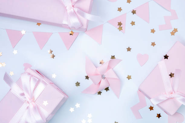 istock background with pink ornaments and gift boxes, decorative, delicate, background. concept of a party or birthday party in pink colors or a newborn baby girl 1839971283