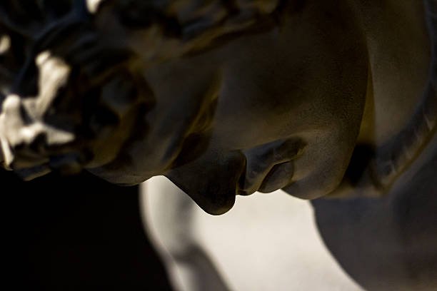 Closeup of a male statue stock photo
