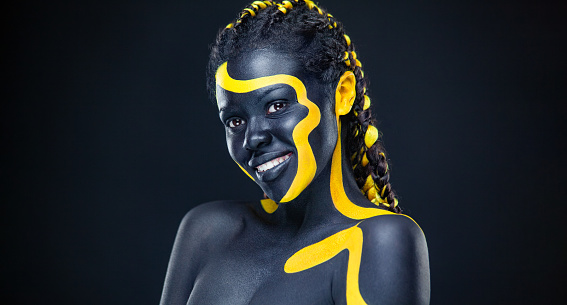 The Art Face. How To Make A Mixtape Cover Design - Download High Resolution picture with black and yellow body paint on african woman for your music song. Create album template with creative Image.