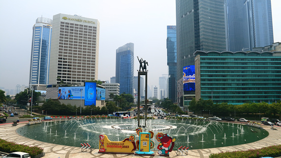 Jakarta, Indonesia - November 21, 2023: Hotel Indonesia Roundabout or Bundaran HI on Jalan Jenderal Sudirman.
