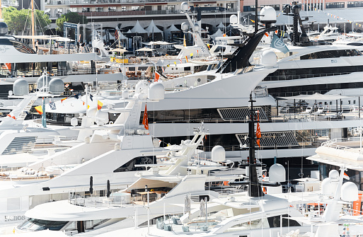 Monaco, Monte Carlo, 28 September 2022 - a lot of luxury yachts at the famous motorboat exhibition in the principality, the most expensive boats for the richest people around the world, yacht brokers