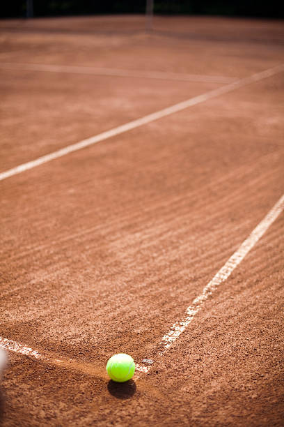 istock Tennis Ball on court 184002897