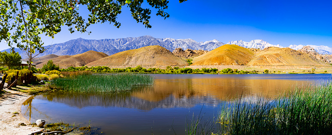 Diaz Lake along the Scenic Byway 395 near Lone Pine, California, in Summer with Alabama Hills and Sierra Nevada in the background