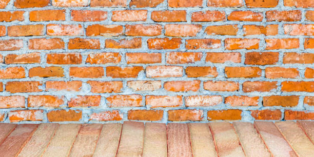 istock the empty wooden table against a brick wall photo courtesy shutterproet 1840094162