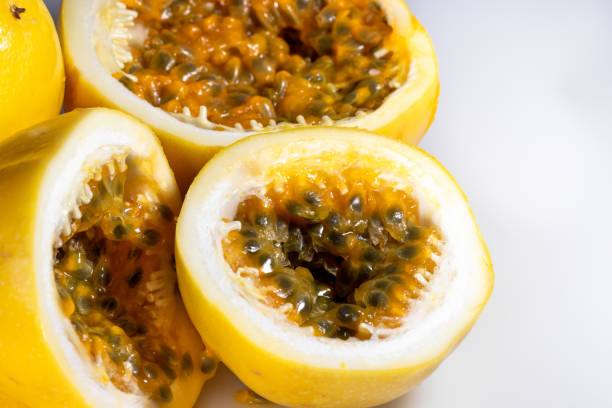 istock close up of a fresh, ripe passion fruit cut in half 1840094171