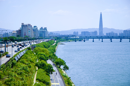 Ttukseom Hangang Park in Seoul offers a refreshing urban escape with its kilometers of beautifully maintained cycling and walking paths. Lined beside the serene Han River, these paths provide a perfect blend of leisure and scenic beauty, inviting both locals and visitors to explore and enjoy.