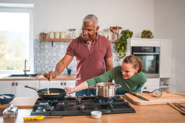 istock Lovely Mature Multi-Ethnic Couple Joins Forces with Love 1840106015
