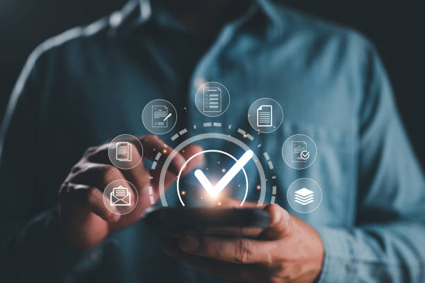 istock Service guarantee, Validation concept for business process automation, quality assurance management, certification, digital transformation. Businessman touching checked icon on virtual screen. 1840116538
