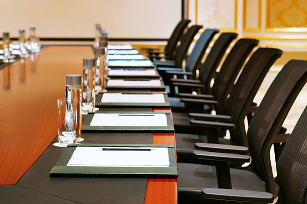 Detail shot of a meeting room A detail shot of a meeting room often referred to as MICE by the hospitality fraternity conference table stock pictures, royalty-free photos & images