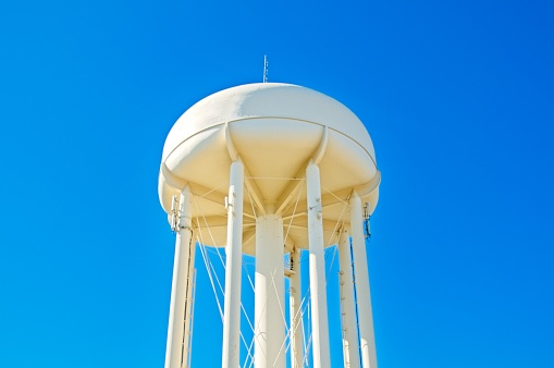 White Water Tower on a blue sky background
