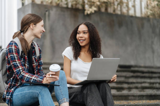 istock Education knowledge and university concept - group of students reading and preparing for exams on holiday. 1840139455