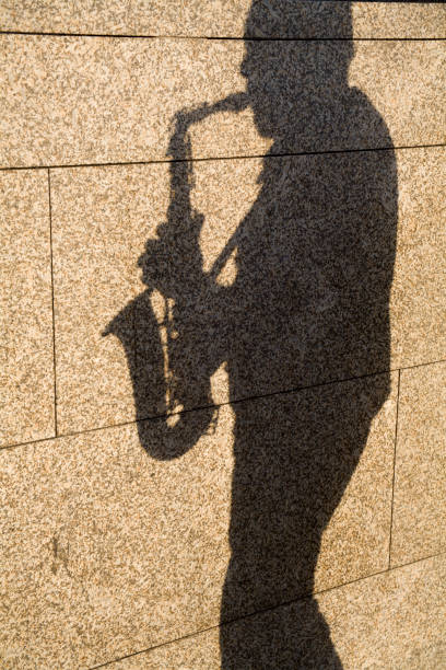 The silhouette of saxophone player