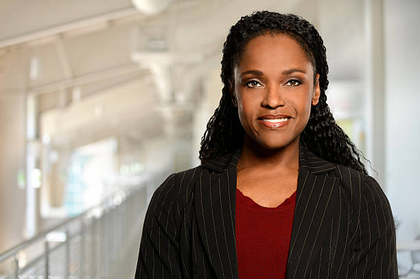istock Businesswoman Smiling Inddors 184017930